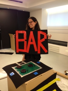 Giorgiana, holding up a piece from our project.
